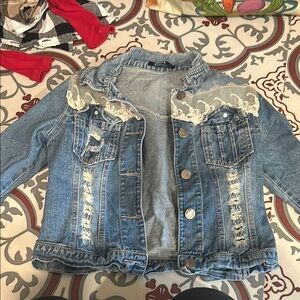 Blue Jean Jackets with Distressing and Cropped Style